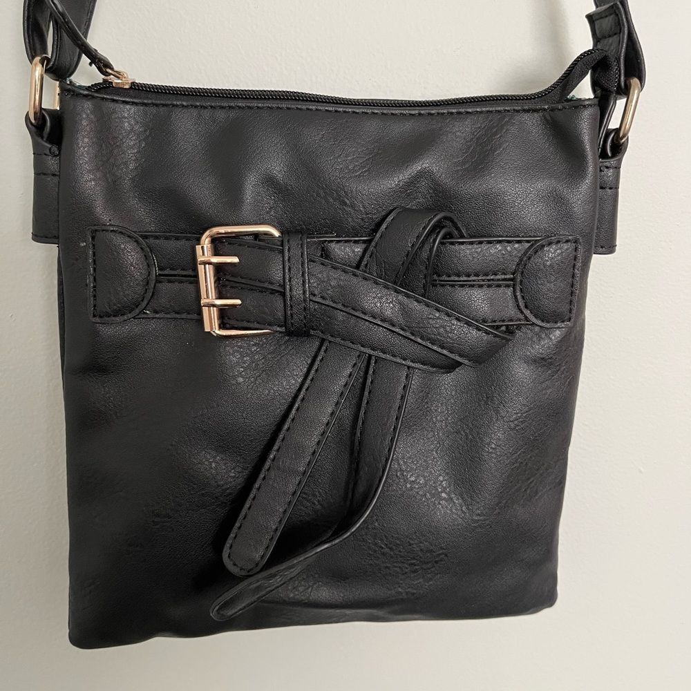 Black Rivet Cross Body Bag.